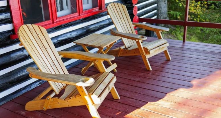 Two chairs on the deck of a cabin