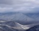 Snow capped mountains near our Wears Valley cabins for rent.