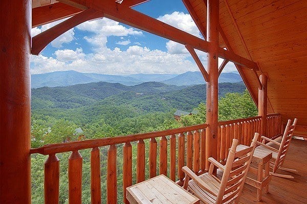 The deck with mountain views at Heavenly Heights Retreat, one of our Smoky Mountain resort cabins.
