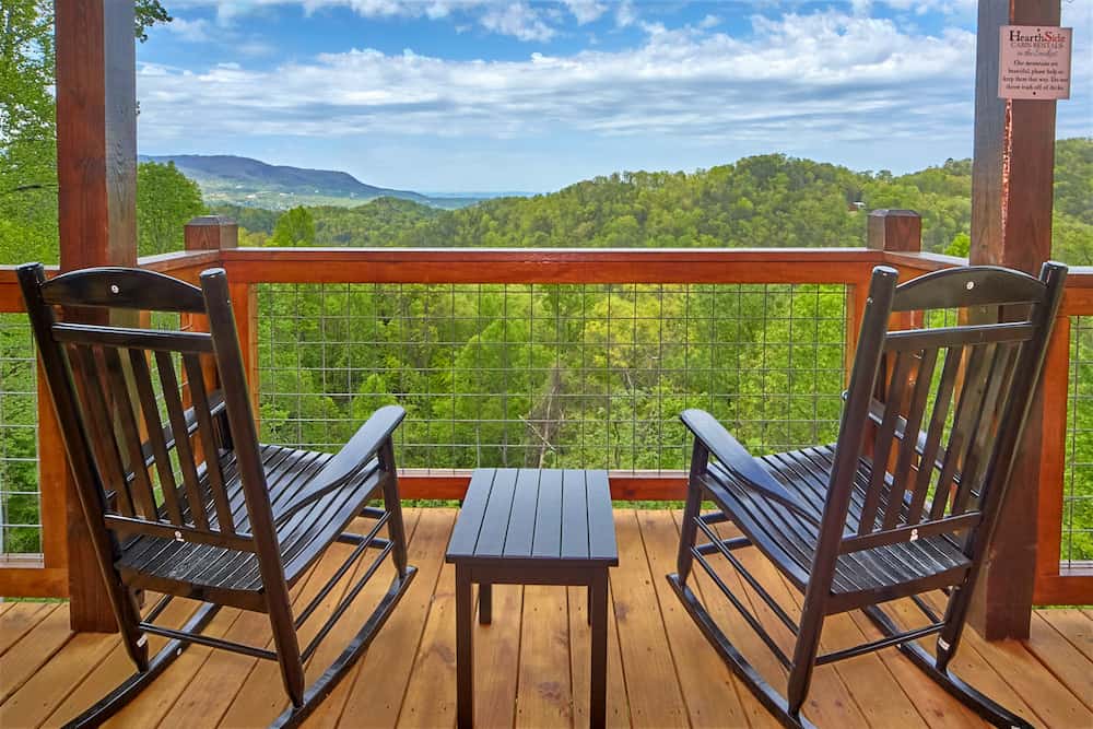chairs on balcony of secluded wears valley cabin