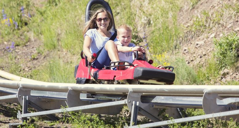 Mother and child on an alpine coaster in Pigeon Forge