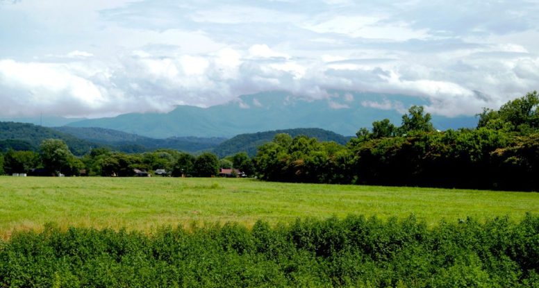 View of the Smoky Mountains and meadows in Wears Valley