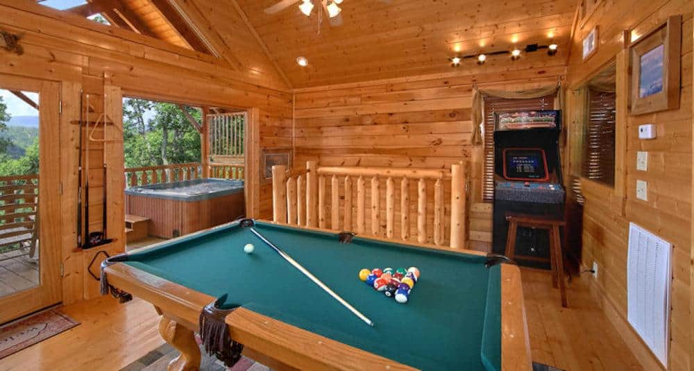 pool table in cabin with game room