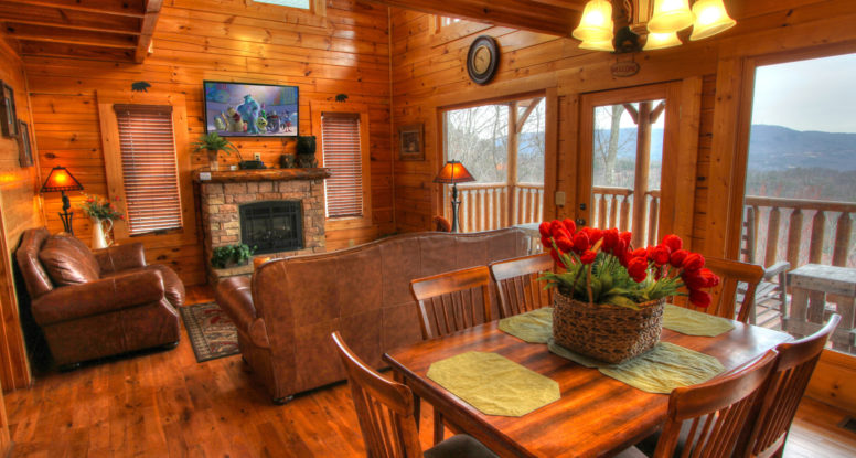 living room and dining room in a smoky mountain cabin for rent