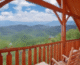 The deck with mountain views at Heavenly Heights Retreat, one of our Smoky Mountain resort cabins.